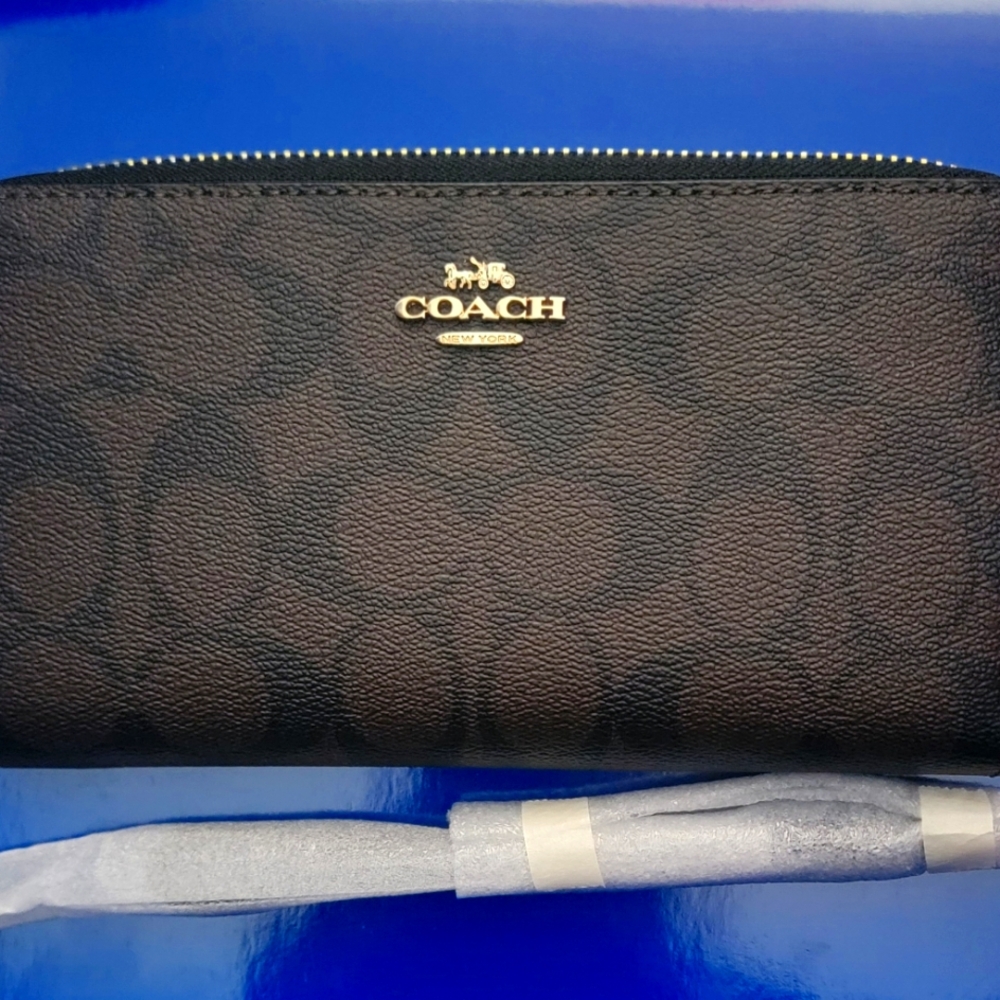 Coach - NEW - Long Zip Around Wallet.  Measures 4"x8"